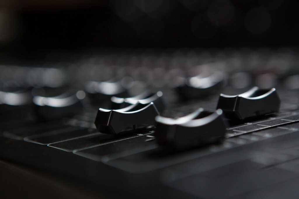 Close-up of sound mixer in recording studio